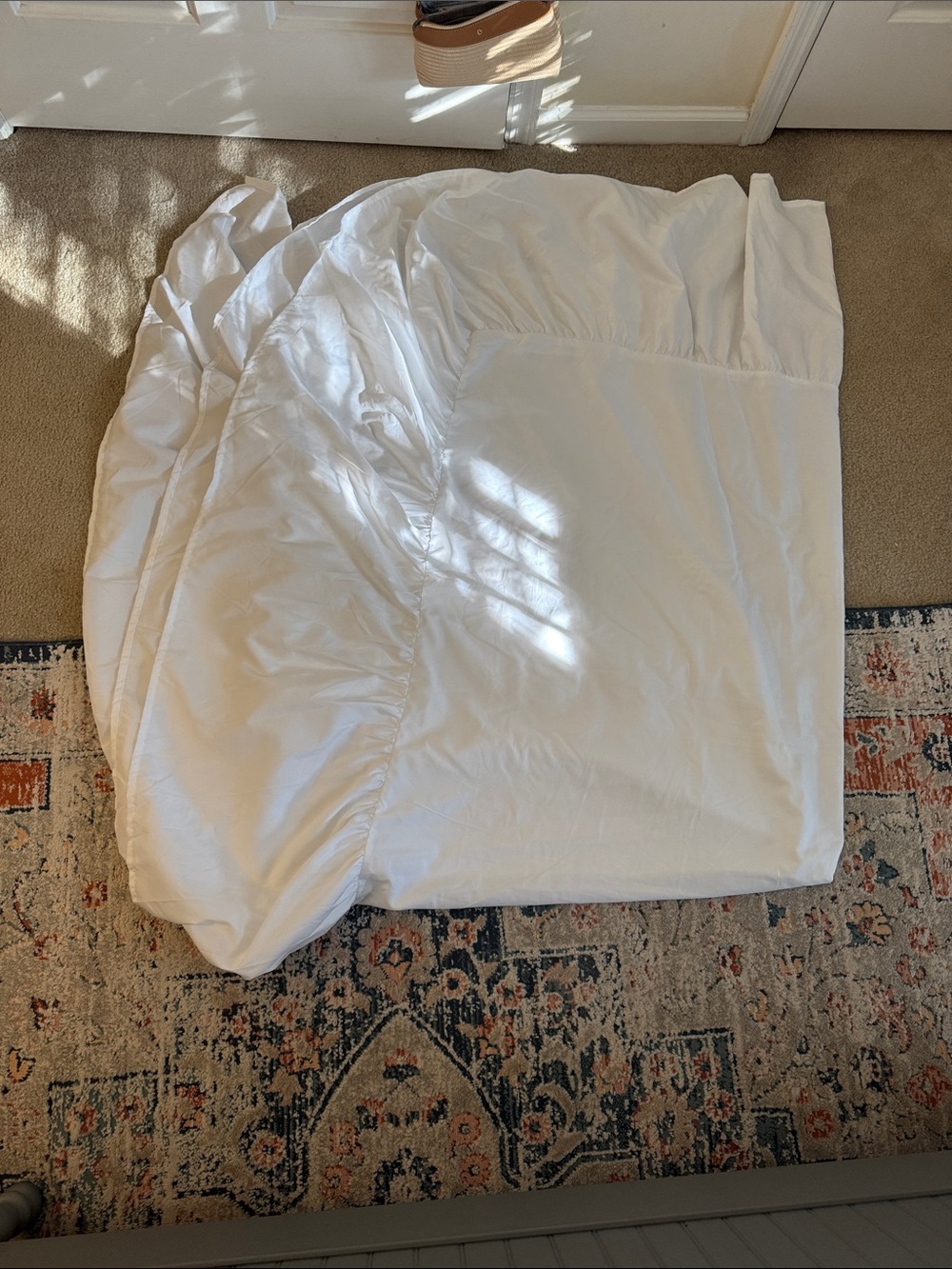 White bed skirt. Queen